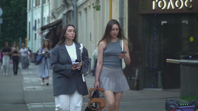 Moscow July 2023. Beautiful Stylish People And Smart Cars On The Streets Of Moscow.