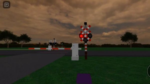 Поезд проезжает бельгийский железнодорожный переезд