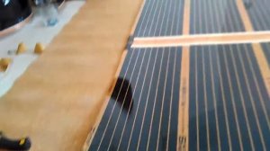 Пленочный теплый пол под ламинат - монтаж своими руками