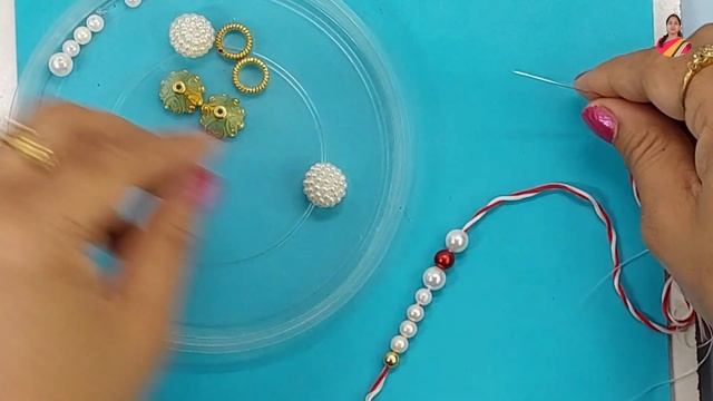 BEAUTIFUL PEARL RAKHI MAKING AT HOME/Handmade Rakhi/Easy Perl Rakhi/DIY/Beads Rakhi 2022 смотреть онлайн