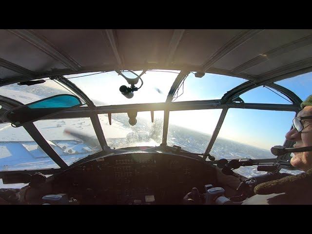 Landing Of The AN-2 Aircraft On A Snowy Field