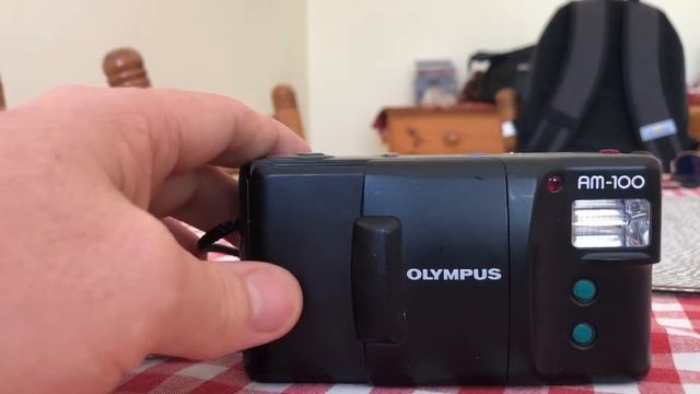 Olympus AM-100 смотреть онлайн