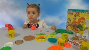 Катя делает игрушечную пиццу из пластилина Play - Doh распаковка набора Pizza un