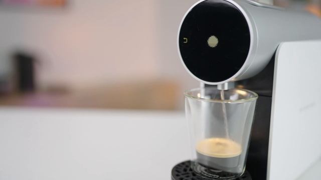 Brewing Coffee Pods On The Morning Capsule Machine