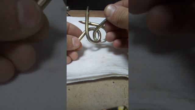 Головоломка из согнутых гвоздей. смотреть онлайн