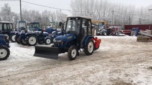 Русич Т 244 с отвалом и щеткой.