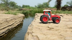 Столкнули экскаватор в воду