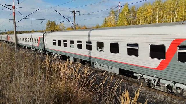 Электровоз ЭП2К-335 с поездом Екатеринбург-Оренбург следует по перегону Кольцово-Арамиль смотреть онлайн