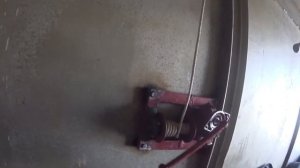 Система хранения прицепа в гараже.