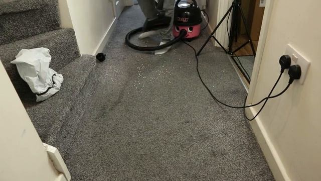 Woman Vacuuming The Hallway Full Of Polystyrene Balls With Your Favourite Numatic Hetty 160