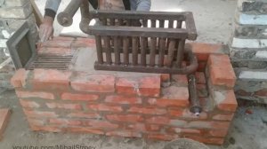 Кирпичная печь с встроенным котлом водяного отопления.