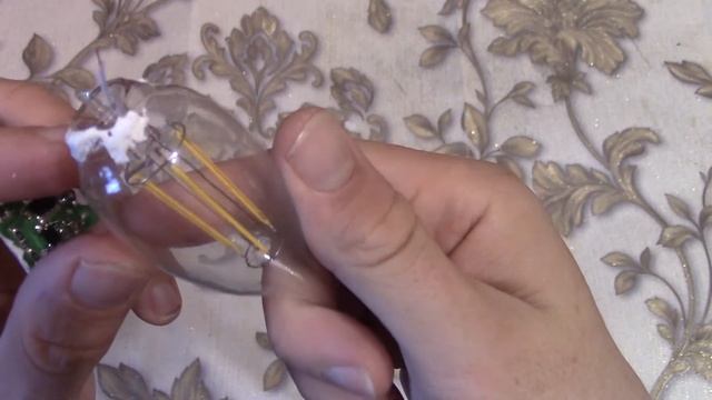 Вскрытие светодиодной лампы ЭРА Filament 5W E14 .