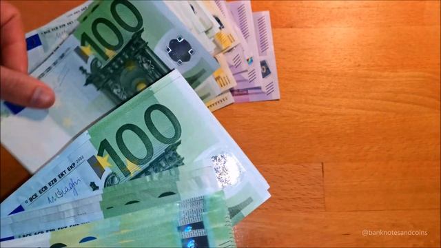 Counting 100, 200 And 500 EURO Banknotes