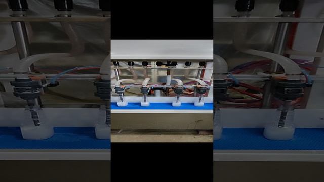 Машина розлива жидких продуктов FLL-5000A с донным наливом смотреть онлайн