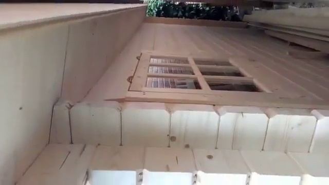 Небольшой садовый домик из профилированного бруса с пристройкой. смотреть онлайн