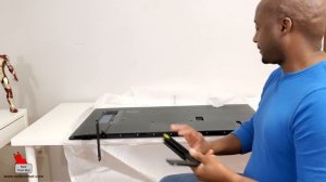 How to install the legs on the Samsung AU8000 Crystal UHD 4K TV (2021)