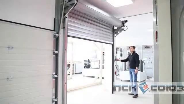 Автоматические секционные ворота - пример работы смотреть онлайн