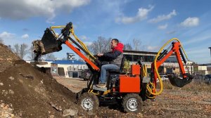 Миниэкскаватор-погрузчик