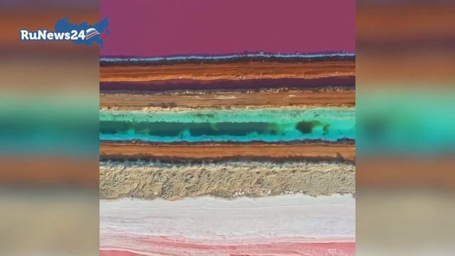 На юго-западе Австралии находится необычное озеро Хиллиер. Оно примечательно розовым цветом воды смотреть онлайн