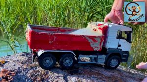 Машинки игрушки. Машинки, песок и вода. Манкиту