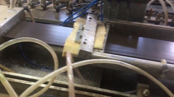 Процесс изготовления профиля заборной доски ДПК на производстве компании RusDecking