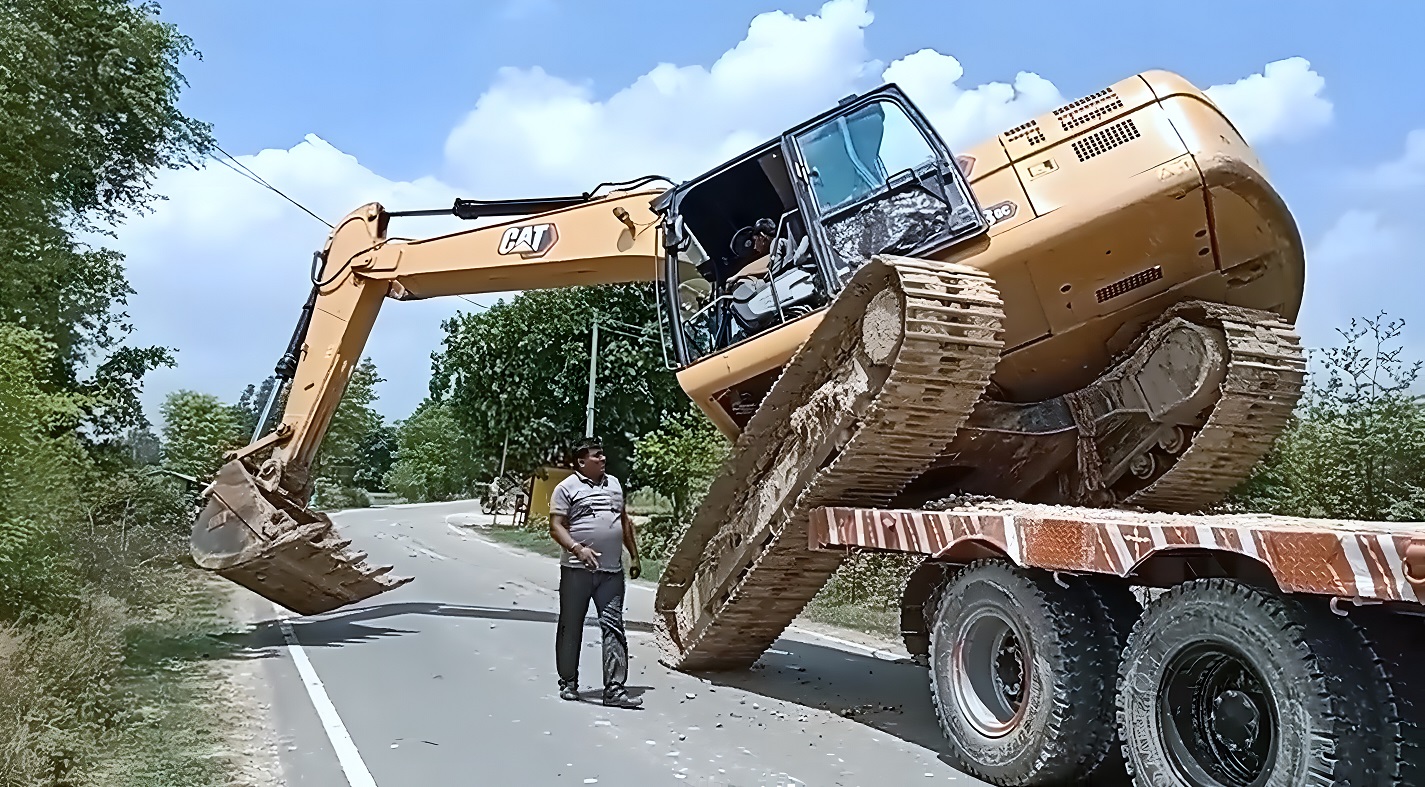 Мастерство 100%. Опытный мастер показал, как загрузить 23-рех тонный экскаватор на трал без заезда. смотреть онлайн