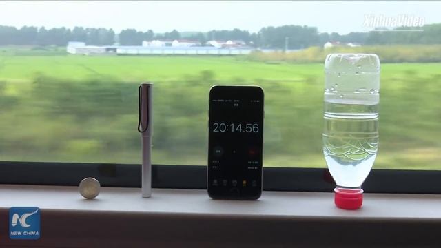 Watch how long coin can balance on high-speed train traveling at 350 kph смотреть онлайн