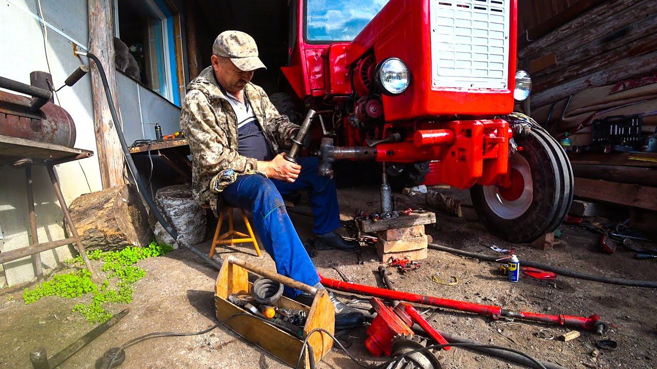 Ремонт и покраска трактора т-25. Меняю втулки и поворотные оси на переднем мосту. смотреть онлайн