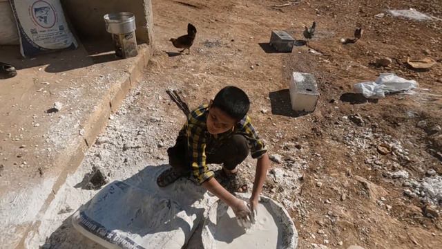 Iranian Nomadic Family: Brewing Fire Tea And Windowing The Nomadic Shelter