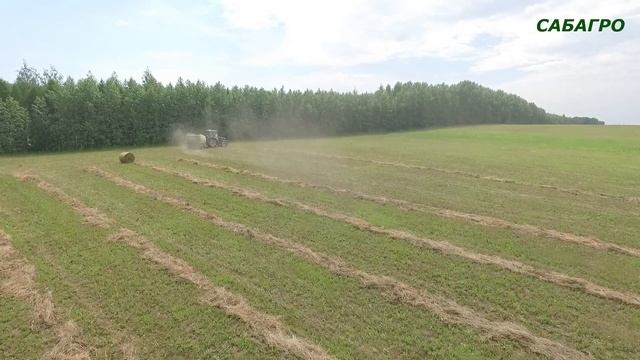 Колёсный трактор Agroapollo CFG1404B с пресс-подборщиком Krone Comprima