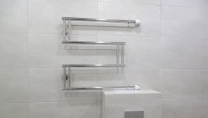 Перенос полотенцесушителя в только что отремонтированной ванной комнате