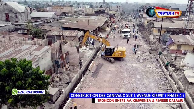 ?% TRAVAUX VUE DU DRONE : CONSTRUCTION DES CANIVEAUX CÔTÉ DROIT SUR L'AVENUE KIKWIT DANS SA PHASE 4 смотреть онлайн