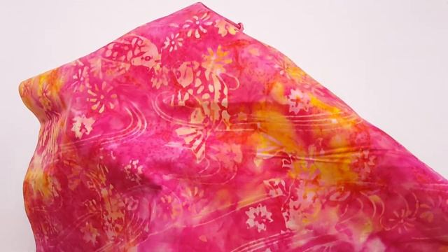 pink flower and fish batik fabric by Trans-Pacific Textiles
