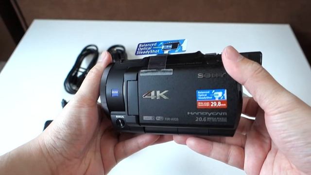 Sony FDR-AX33/B 4K Handycam Camcorder Unboxing смотреть онлайн