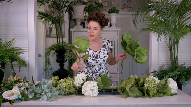 Christmas florals for your fire mantle of hydrangea with protea, magnolia and winter roses смотреть онлайн