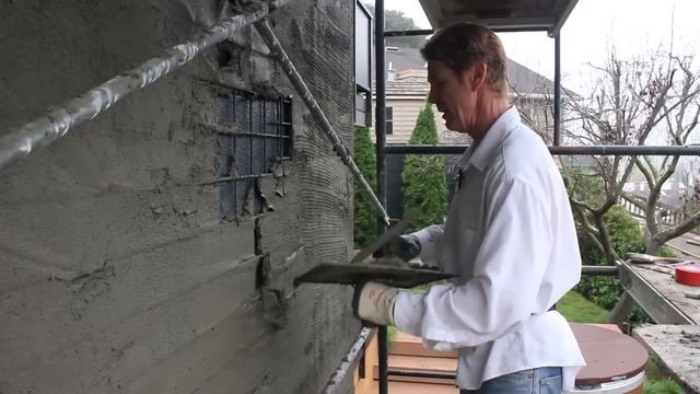 Reinforce A Concrete Block Chimney Then Apply Stucco.