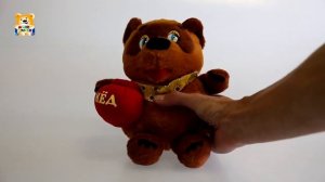 Озвученная мягкая игрушка - Винни Пух с горшком меда