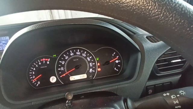 Тойота Вокси.