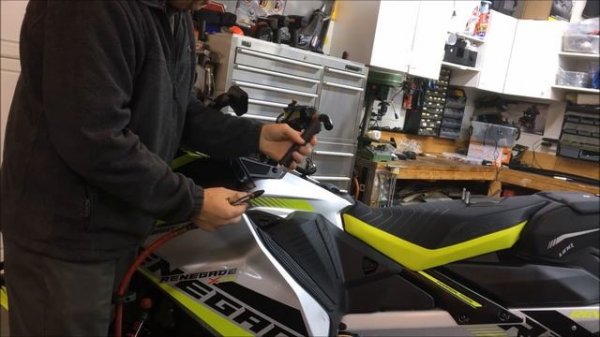Remove and install BRP Ski-Doo snowmobile hand grips.