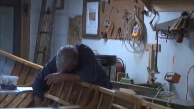 Hand-built wooden rowboat getting ready to hit the water in Marquette смотреть онлайн