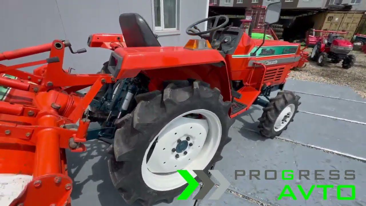 Трактор Кубота (Kubota) L1-185 в комплекте с почвофрезой смотреть онлайн