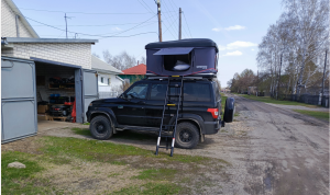 Установил палатку на крышу