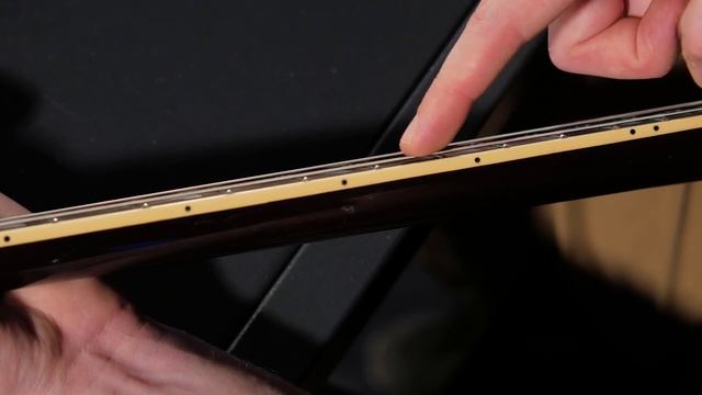 34. Как настроить прогиб грифа, и в какую сторону крутить анкер?