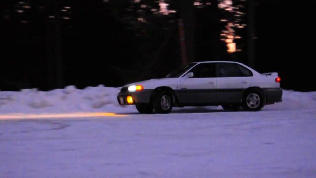 White Subaru Legacy drifting on snow смотреть онлайн