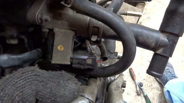 Где находится номер двигателя на Mazda Demio 1996-2002 год