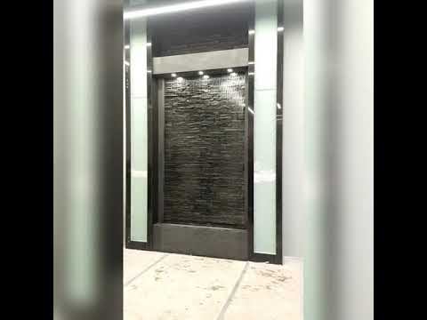 Водопад по стеклу с отделкой каменным шпоном. смотреть онлайн