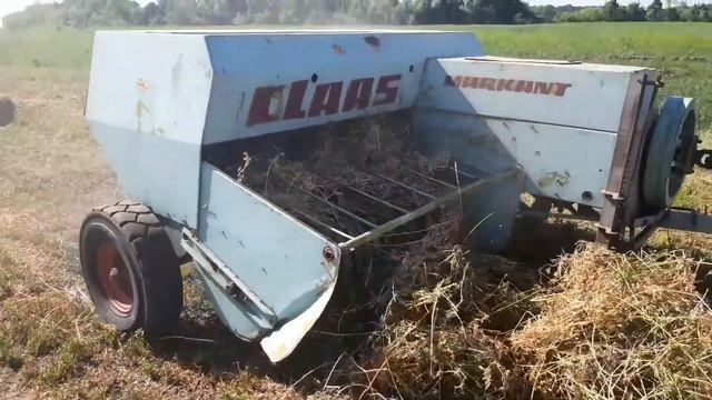 Работа пресс подборщика Claas markant 50 замедленная съемка вязального аппарата смотреть онлайн