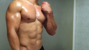 young bodybuilder showing pumped muscle | flexing | muscle worship