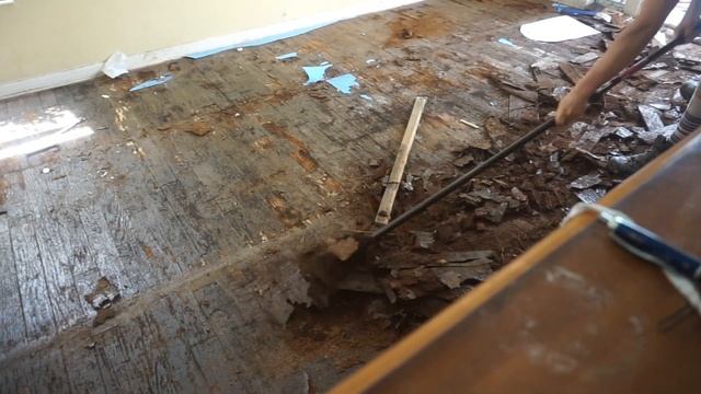 PROBLEM WITH WOOD FLOORING - WOOD FLOORING REMOVAL, WATER DAMAGED WOOD FLOORING REMOVAL ON VINYL JO