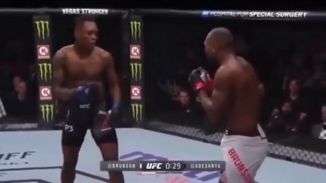 Israel Adensanya using the question mark kick to straight right combo смотреть онлайн